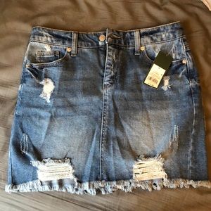 NWT partially distressed jean skirt